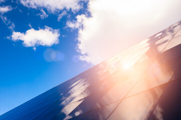 Poster - Close-Up Of Modern Office Buildings, dawn sunset with clouds reflected in the windows