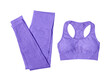 Women's sports bra and leggings in purple color isolated on white background.