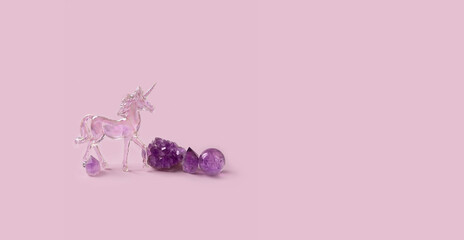 Wall Mural - amethyst minerals set and crystal unicorn on pink background. Magic gemstones for Crystal Ritual. Witchcraft, Relaxation spiritual practice, Esoteric and life balance concept. banner. copy space