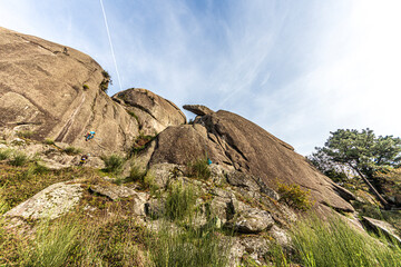 Poster - climbing on a rock