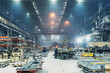 © DedMityay - Interior of metalworking factory workshop hangar. Modern industrial enterprise production.