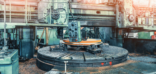 Wall Mural - Large horizontal rotating turning and milling machine for processing metal products at metallurgical plant.