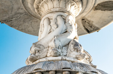 Wall Mural - Detail of the fountain of the Young Fisherman (Fontana del Pescatorello), sculpted in the 19th century, in Duomo square, Prato city, Tuscany region, Italy