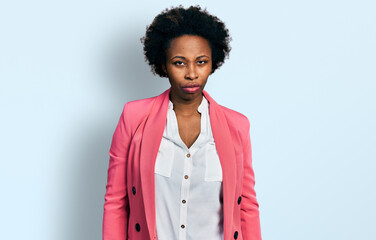 Canvas Print - African american woman with afro hair wearing business jacket skeptic and nervous, frowning upset because of problem. negative person.