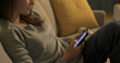 © stokkete - Teenager sitting on the couch and chatting