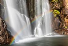 Australia, Victoria, Halls Gap, Long Exposure Of MacKenzie Falls In Grampians National Park With Rainbow In Foreground