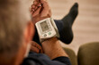 © Westend61 - Man measuring blood pressure at home