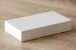 © Piman Khrutmuang - Mockup white box on wood table background
