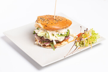 Wall Mural - details of tasty beef burger with coleslaw salad on white background