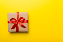 Holiday Present Box Over Colored Background, Top View. Copy Space For Design