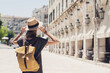 © kite_rin - Travel concept, beautiful tourist woman walking in Kerkyra old town during vacation, cheerful student girl traveling abroad in summer, Corfu island, Greece