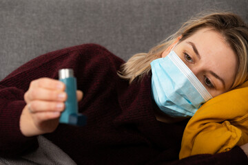 Wall Mural - Sick woman with protective mask at home