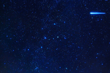 Wall Mural - Stars on the background of the night starry sky with many constellations, universes and shooting stars
