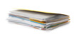 © New Africa - Stack of different files with documents on white background