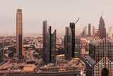 Fototapeta Miasto - DUBAI, UAE - FEBRUARY 2018: Dubai skyline at sunset with Burj Khalifa, the world tallest building and Sheikh Zayed road traffic