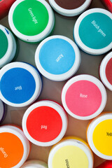 Wall Mural - Colorful paint jars closeup