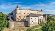 Aerial View Of Zvolen Castle In Slovakia With Renaissance Palace, Outer Ring Of Wall, Turrets, Corner Tower, Massive Gate Tower, Gothic Chapel