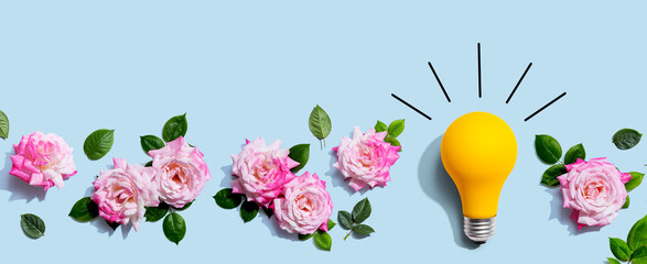 Poster - Light bulb with pink roses - flat lay