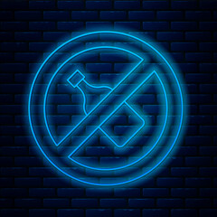 Poster - Glowing neon line No alcohol icon isolated on brick wall background. Prohibiting alcohol beverages. Forbidden symbol with beer bottle glass. Vector