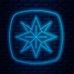 Wall Mural - Glowing neon line Wind rose icon isolated on brick wall background. Compass icon for travel. Navigation design. Vector