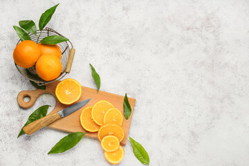 Sticker - Basket with fresh juicy oranges on light background