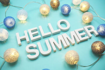 Wall Mural - hello summer alphabet letter decorate with led cotton balls on blue background