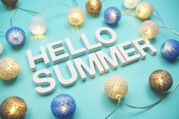 Wall Mural - hello summer alphabet letter decorate with led cotton balls on blue background