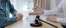 Attorney Or Judge Provides Legal Advice To The Client In The Courtroom, Ethics In The Courts Include Justice And Impartiality, Legal Consultant, Scales Of Justice, Law Hammer, Litigation And Justice.