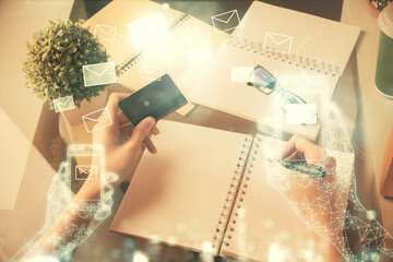 Poster - Multi exposure of woman on-line shopping holding a credit card and envelop drawing. e-commerce concept.