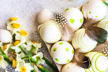 Overhead View Of Painted Easter Eggs With Narcissus Flowers