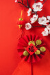 © RomixImage - Chinese lunar new year background design concept with red plum blossom and festive decoration.