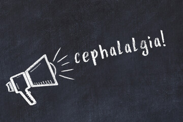 Chalk sketch of loudspeaker and inscription cephalalgia