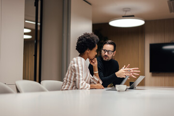 Serious business partners, figuring out their next step in the future business.