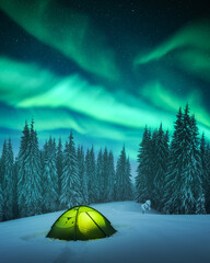 Wall Mural - yellow tent lighted from the inside against the backdrop of incredible starry sky with aurora boreal