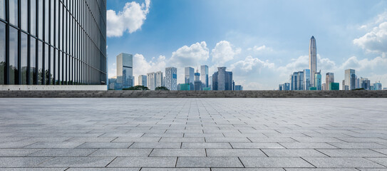 Panoramic skyline and modern commercial office buildings with empty road at Shenzhen, China. empty square floors and cityscape.