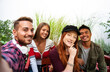 © Davide Zanin - Multicultural guys and girls taking selfie outdoors - Happy friendship concept on young multiethnic people having fun day together