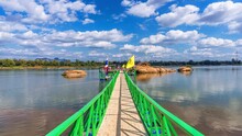 A Bridge Leading To The Buddha's Footprint In The Middle Of The Mekong River In Tha Uthen District, Nakhon Phanom Province, Thailand.