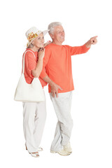 Sticker - Portrait of happy senior couple pointing to the right isolated on white background