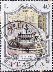 Wall Mural - Italy - circa 1974: a postage stamp from Italy showing the historic Fountains- Perugia