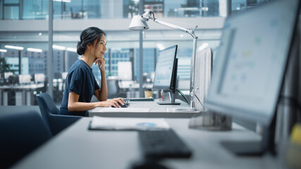 Aufkleber - In Big Diverse Corporate Office: Portrait of Beautiful Asian Manager Using Desktop Computer, Businesswoman Managing Company Operations, Analysing Statistics, Commerce Data, Marketing Plans.