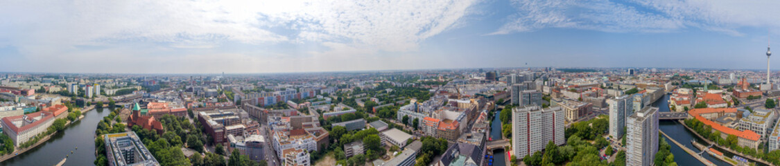 Sticker - BERLIN, GERMANY - JULY 24, 2016: Panoramic aerial view of Berlin skyline at sunset with major city landmarks along Spree river.