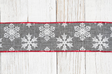 Canvas Print - Gray and white snowflake border winter background with weathered wood