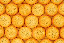 Group Of Mini Cheese Flavoured Savoury Biscuit Crackers Background