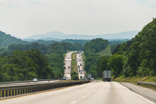 Virginia interstate highway i81 81 steep road with traffic cars trucks in summer and scenic trip open view of blue ridge mountains