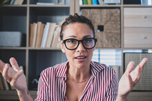 Confused Doubtful Woman Feeling Baffled Looking At Camera Unaware About Problem. Portrait Of Clueless Cauacsian Businesswoman Unsure About What Happened. Female Executive