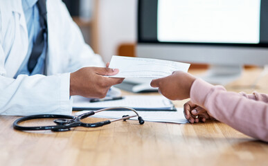 Aufkleber - Here's your sick note for work. Closeup shot of an unrecognisable doctor giving paperwork to a patient during a consultation.