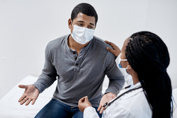 Aufkleber - Give it to me straight, doc. Shot of a young man having a consultation with a doctor.