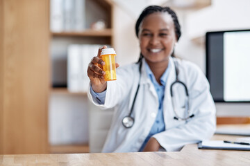 Aufkleber - Take these and get some rest. Portrait of a young doctor holding a bottle of pills in her office.