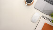 © bongkarn - Simple office workspace with notebook laptop and copy space on white background.