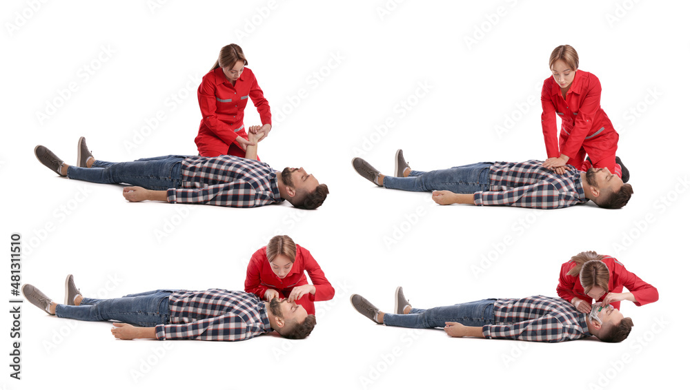 Paramedic performing first aid on unconscious woman against white ...